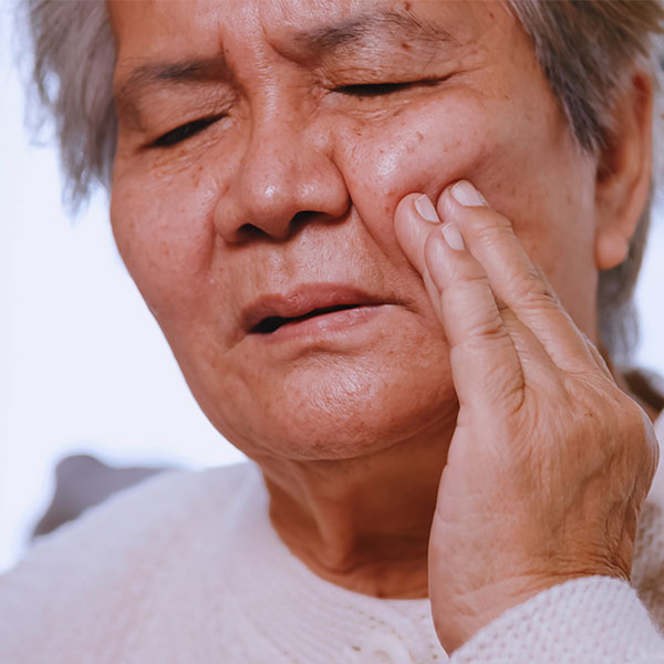 Patient experiencing dental emergency