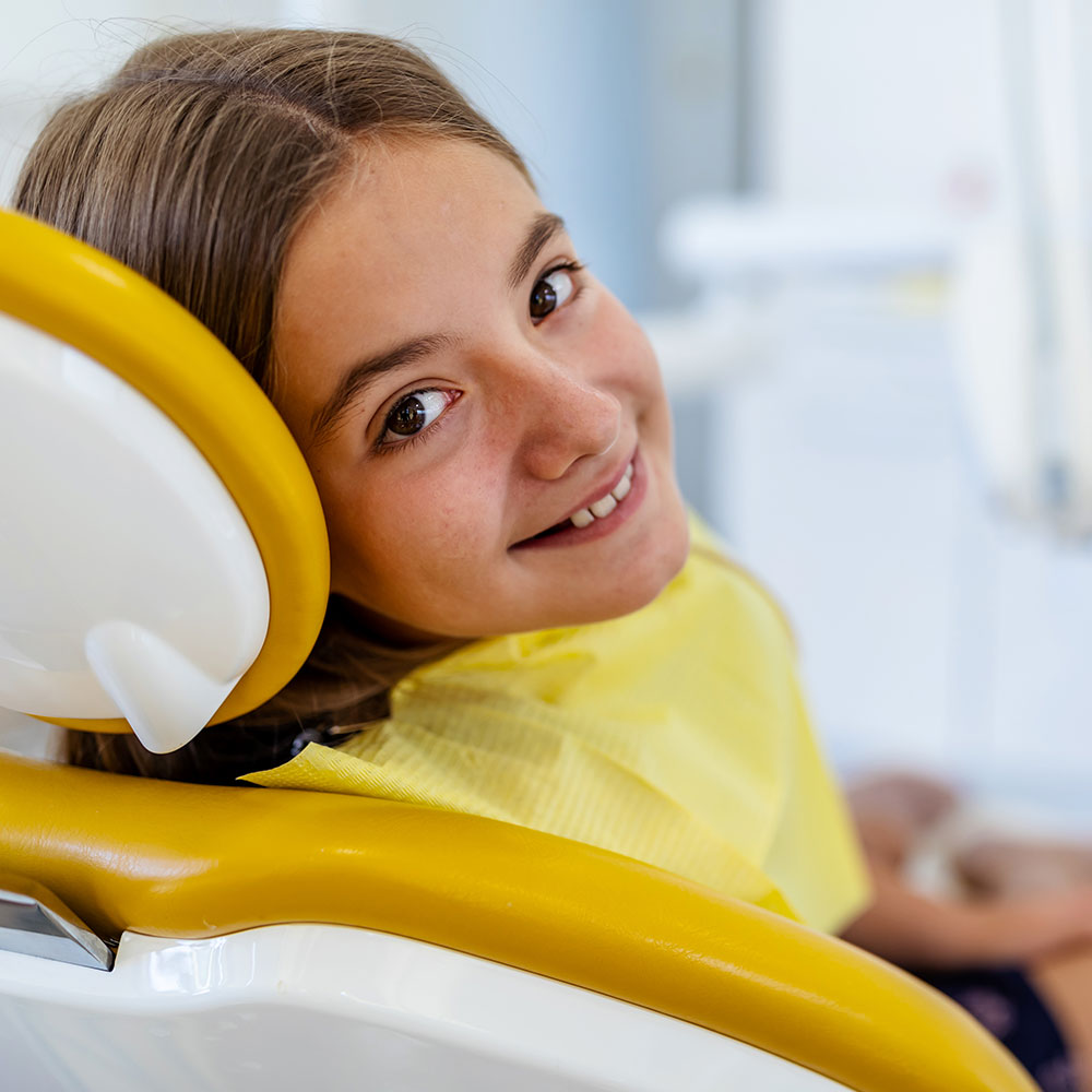 Dental patient smiling near Norwalk