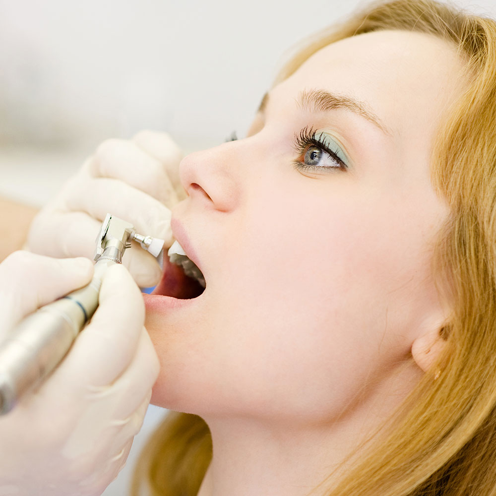 Dental patient smiling near South Gate